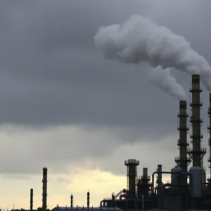 Oil refinery with smoke stacks in California