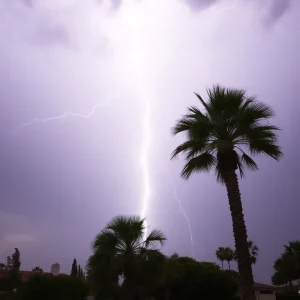 Lightning striking a palm tree during a storm in Huntington Beach